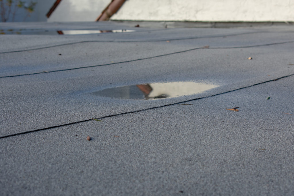 Weathered flat roof